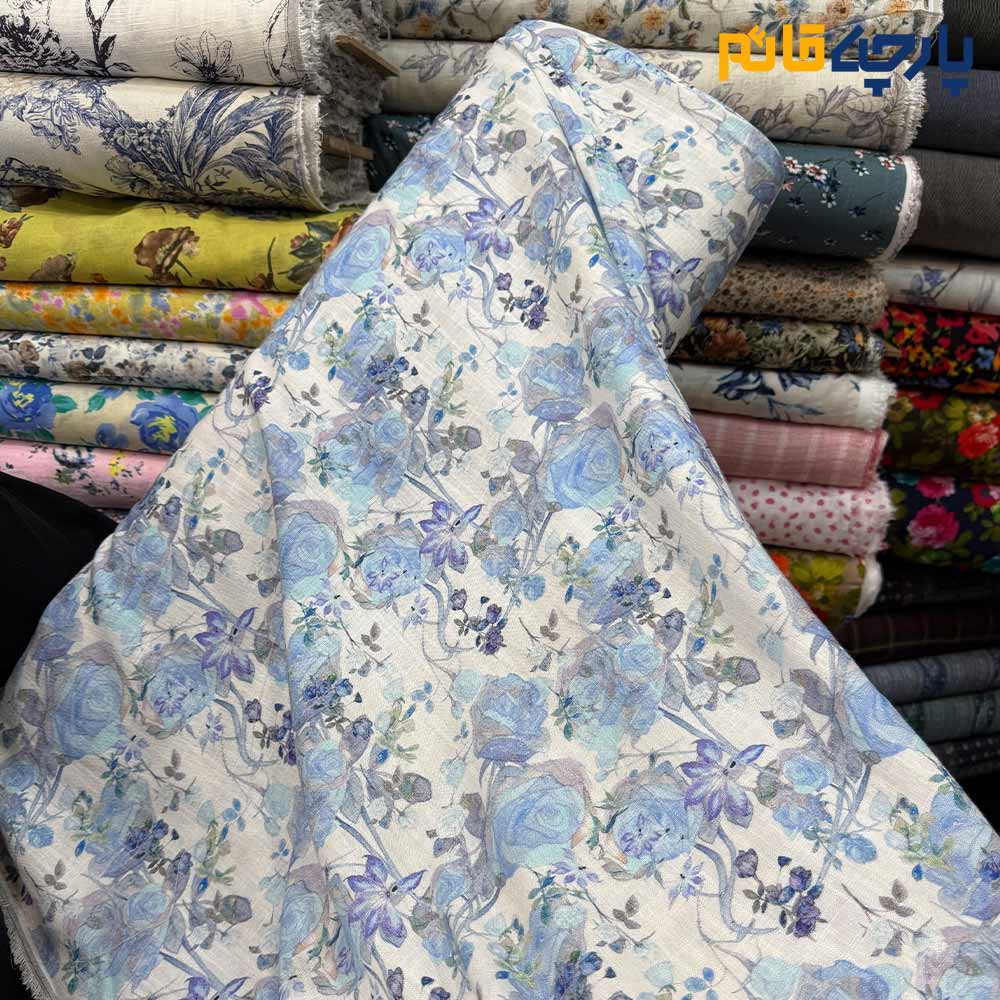 پارچه بهاره تابستانه لینن طرحدار ایتالیایی زمینه روشن گل آبی روشن