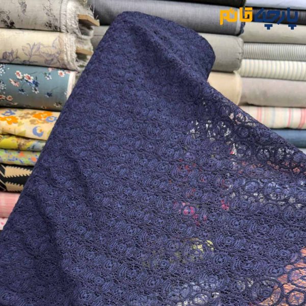 پارچه مجلسی تور کتان کره ای رنگ سرمه ای روشن طرح دایره ریز و متوسط