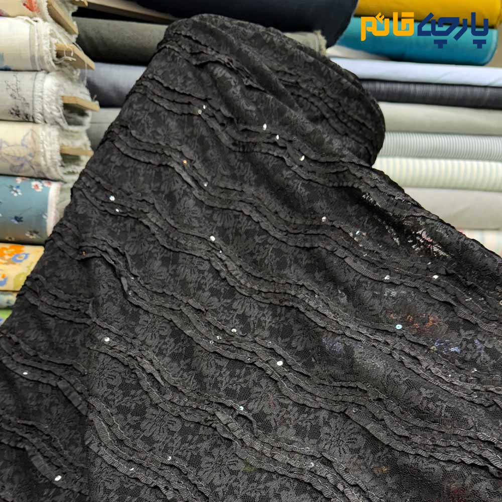 پارچه مجلسی تور کتان ایتالیایی رنگ مشکی طرح برجسته خطی لمه دوزی