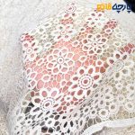 پارچه مجلسی تور کتان کره طرح گل خوشه رنگ کرم طبیعی(نچرال)