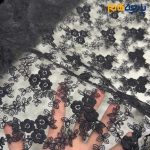 پارچه مجلسی تور کتان ایتالیایی طرح گل متوسط حاشیه دار رنگ مشکی دودی