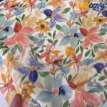 پارچه بهاره تابستانه لینن طرحدار ایتالیایی زمینه هلویی گل رنگی