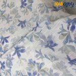پارچه بهاره تابستانه لینن طرحدار ایتالیایی زمینه سفید آفوایت گل آبی یاسی