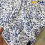 پارچه بهاره تابستانه لینن طرحدار ایتالیایی زمینه سفید گل ریز آبی کاربنی