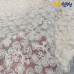 پارچه مجلسی تور کتان کره ای طرح خاص گل ومنحنی رنگ کرم طبیعی (نچرال)