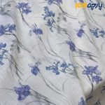 پارچه بهاره تابستانه لینن طرحدار ایتالیایی زمینه سفید گل خطی آبی بنفش