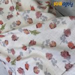 پارچه بهاره تابستانه لینن طرحدار ایتالیایی زمینه شیری کرم روشن گل قرمز خوشرنگ