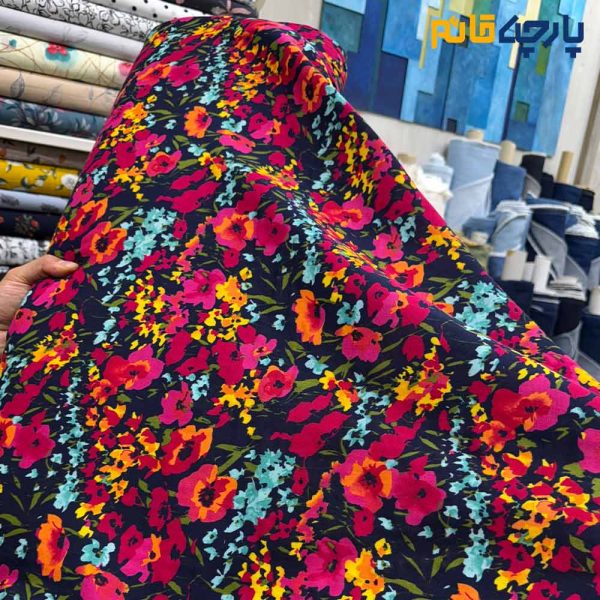 پارچه بهاره و تابستانه لینن طرحدار کره ای زمینه سرمه ای گل رنگی شاد