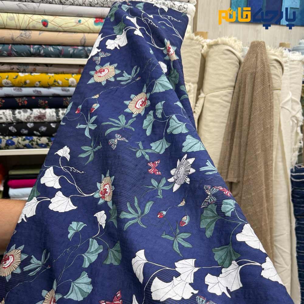 پارچه بهاره و تابستانه وال طرحدار کره ای زمینه سرمه ای طرح گل شیپوری