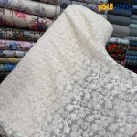پارچه مجلسی تور کتان کره ای طرح خاص گل ومنحنی رنگ کرم طبیعی (نچرال)
