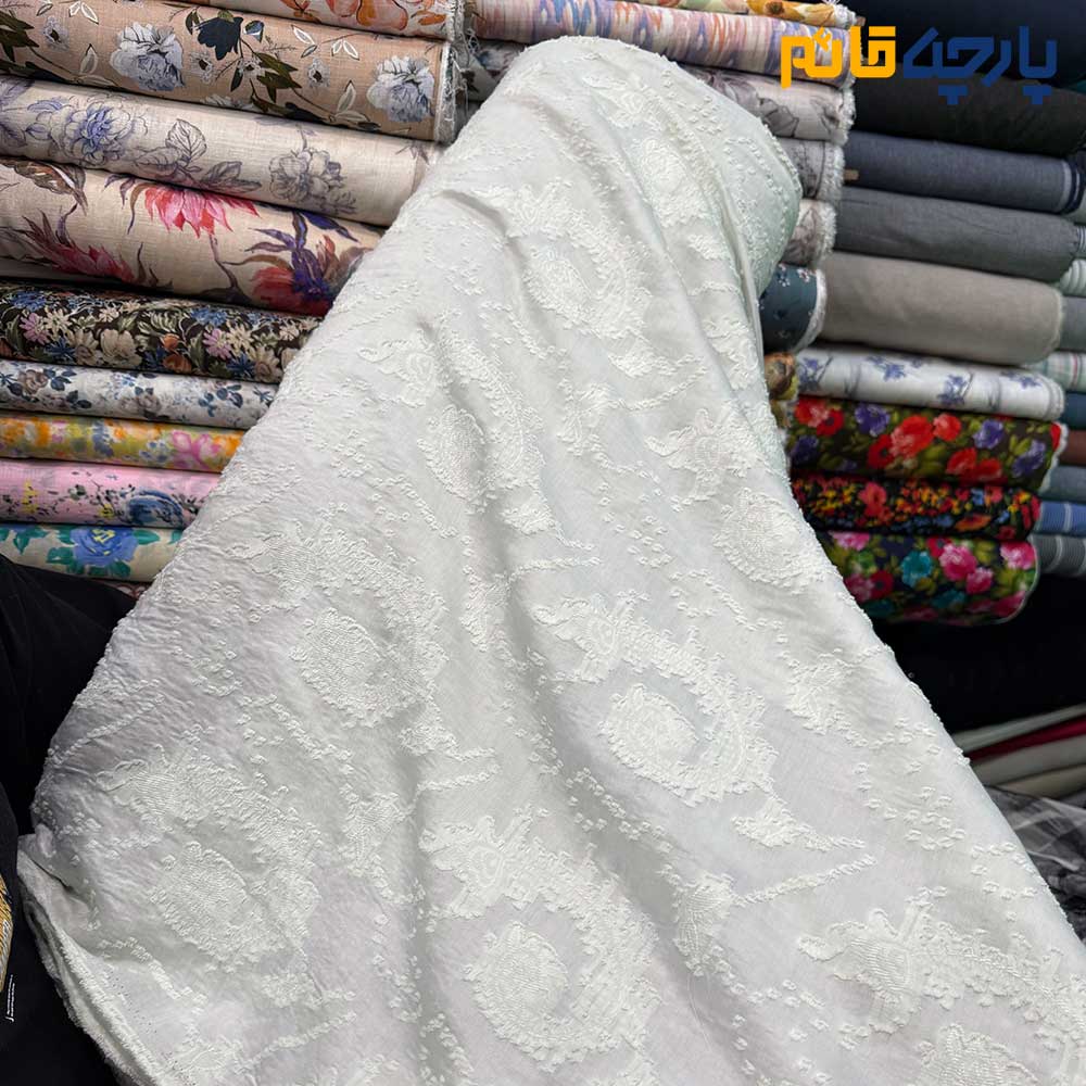 پارچه مجلسی ژاکارد پییس نخ ژاپن طرح اشکی برجسته رنگ سبز نعنایی(مینت)