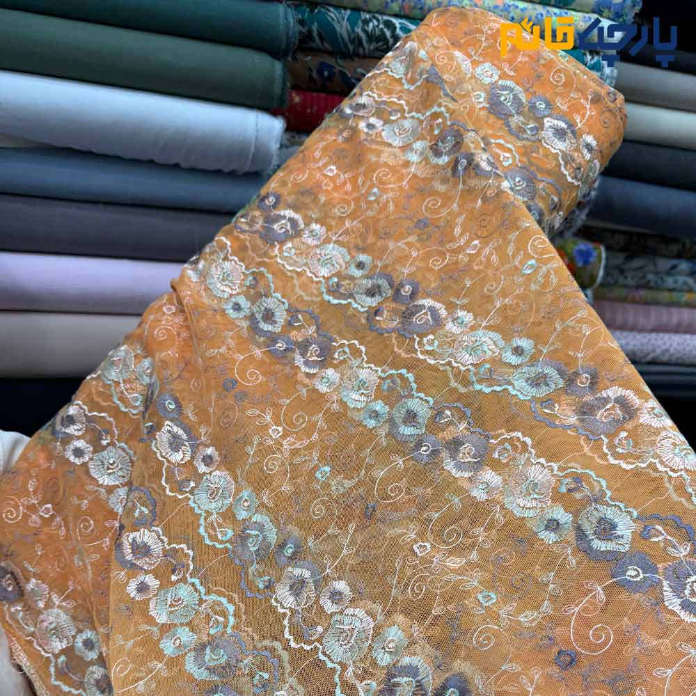 پارچه مجلسی دانتل کره ای زمینه نارنجی متوسط گل رنگی
