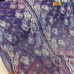 پارچه مجلسی دانتل کره ای زمینه بنفش متوسط گل رنگی