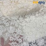پارچه مجلسی تور کتان ایتالیایی گل هشتی خاص رنگ کرم طبیعی