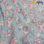 پارچه بهاره و تابستانه وال طرحدار کره زمينه ابي روشن گل صورتي