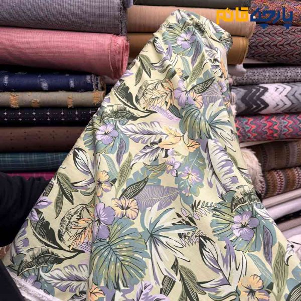 پارچه بهاره و تابستانه وال طرحدار کره طرح برگ هاوايي زمينه سبز روشن