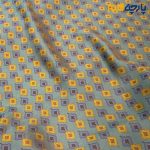 پارچه بهاره تابستانه سیلک نخ طرحدار زمینه رنگ سبز آووکادیی طرح لوزی ریز