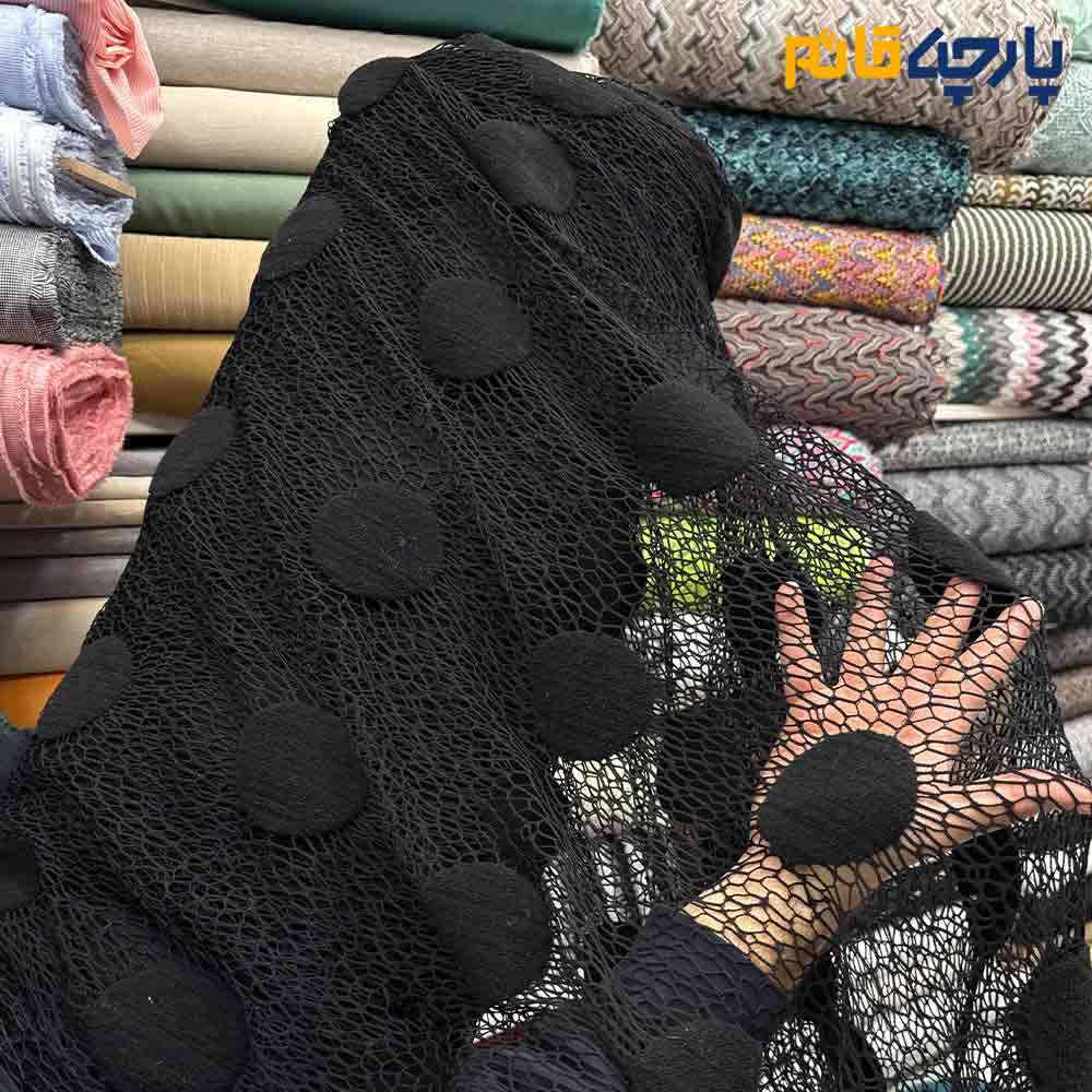 پارچه مجلسی تور کتان کره ای دایره برجسته درشت رنگ مشکی پر کلاغی