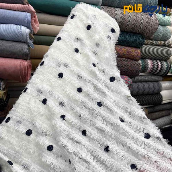 پارچه مجلسی تور کتان کره ای طرح راه راه پر سفید با گلدوزی سرمه ای دایره ای