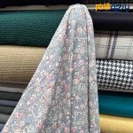 پارچه بهاره و تابستانه کرپ نخ طرحدار گل متوسط رنگی زمینه طوسی روشن