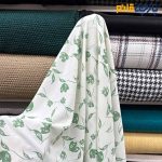 پارچه بهاره و تابستانه کرپ نخ طرحدار زمینه سفید آفوایت گل سبز نعنایی(مینت)