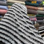 پارچه مجلسی تور کتان کره ای زمینه حریر مشکی ریشه سفید