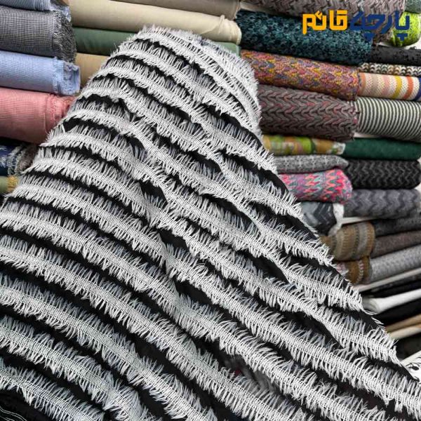 پارچه مجلسی تور کتان کره ای زمینه حریر مشکی ریشه سفید