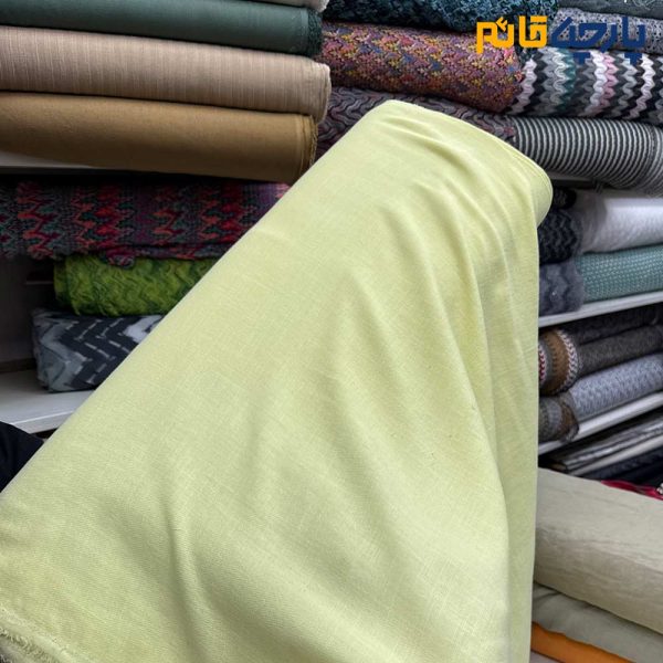 پارچه بهاره تابستانه لینن ساده رنگ لیمویی روشن عرض ۱۵۰