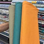 پارچه بهاره تابستانه لینن سفارشی ساده رنگ فیروزه ای متوسط(بنتون) عرض ۱۵۰