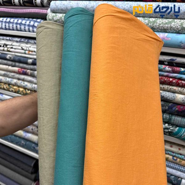 پارچه بهاره تابستانه لینن سفارشی ساده رنگ فیروزه ای متوسط(بنتون) عرض ۱۵۰