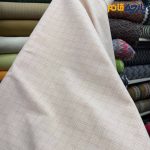 پارچه بهاره تابستانه لینن ساده طرح از خود رنگ صورتی کرم عرض ۱۵۰