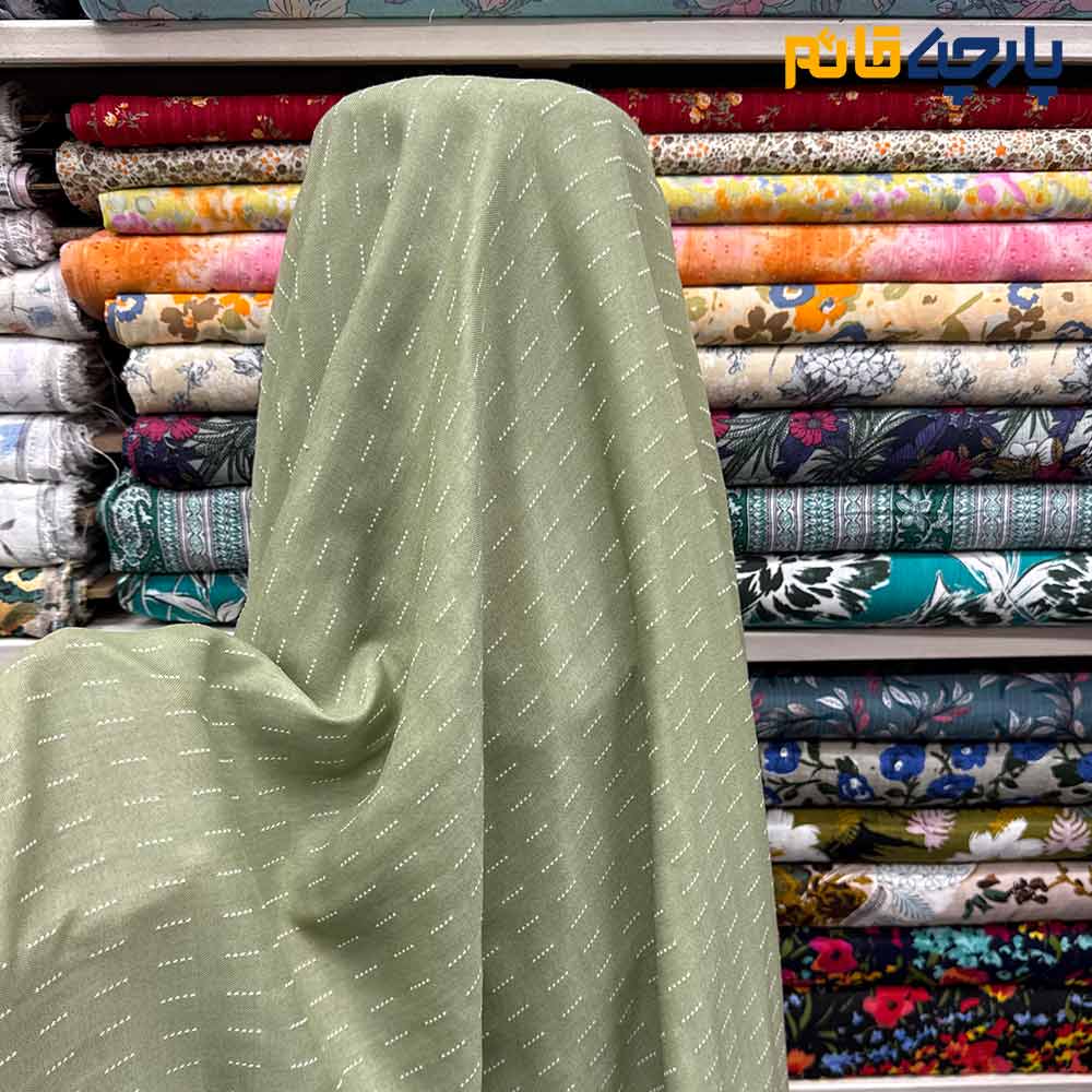پارچه بهاره تابستانه لینن طرحدار دبل فیس طرح خطی رنگ سبز ماچایی عرض ۱۵۰