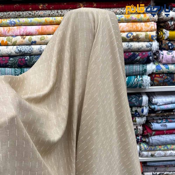 پارچه بهاره تابستانه لینن طرحدار دبل فیس طرح خطی رنگ کرم روشن عرض ۱۵۰