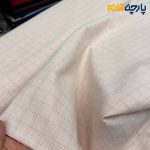 پارچه بهاره تابستانه لینن ساده طرح از خود رنگ صورتی کرم عرض ۱۵۰