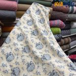 پارچه بهاره تابستانه لینن طرحدار کره ای زمینه کرم لیمونی طرح طوسی