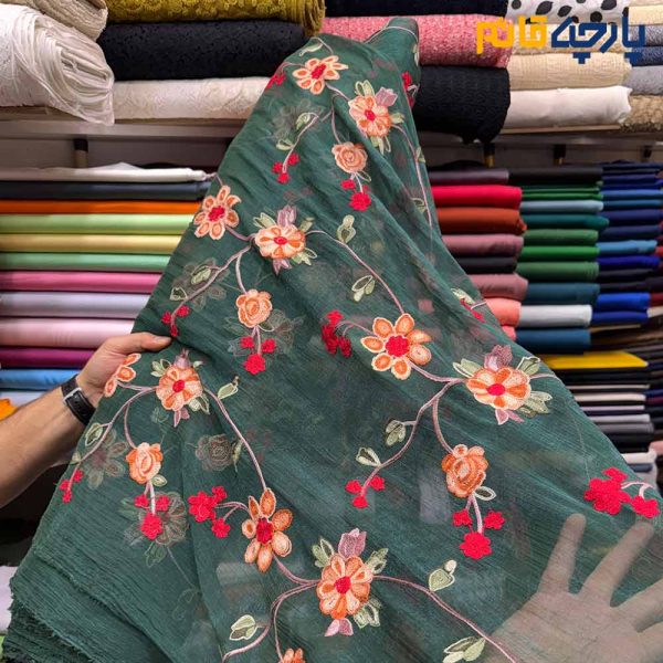 پارچه حریر طرحدار ابریشم گل دوزی زمینه سبز تیره