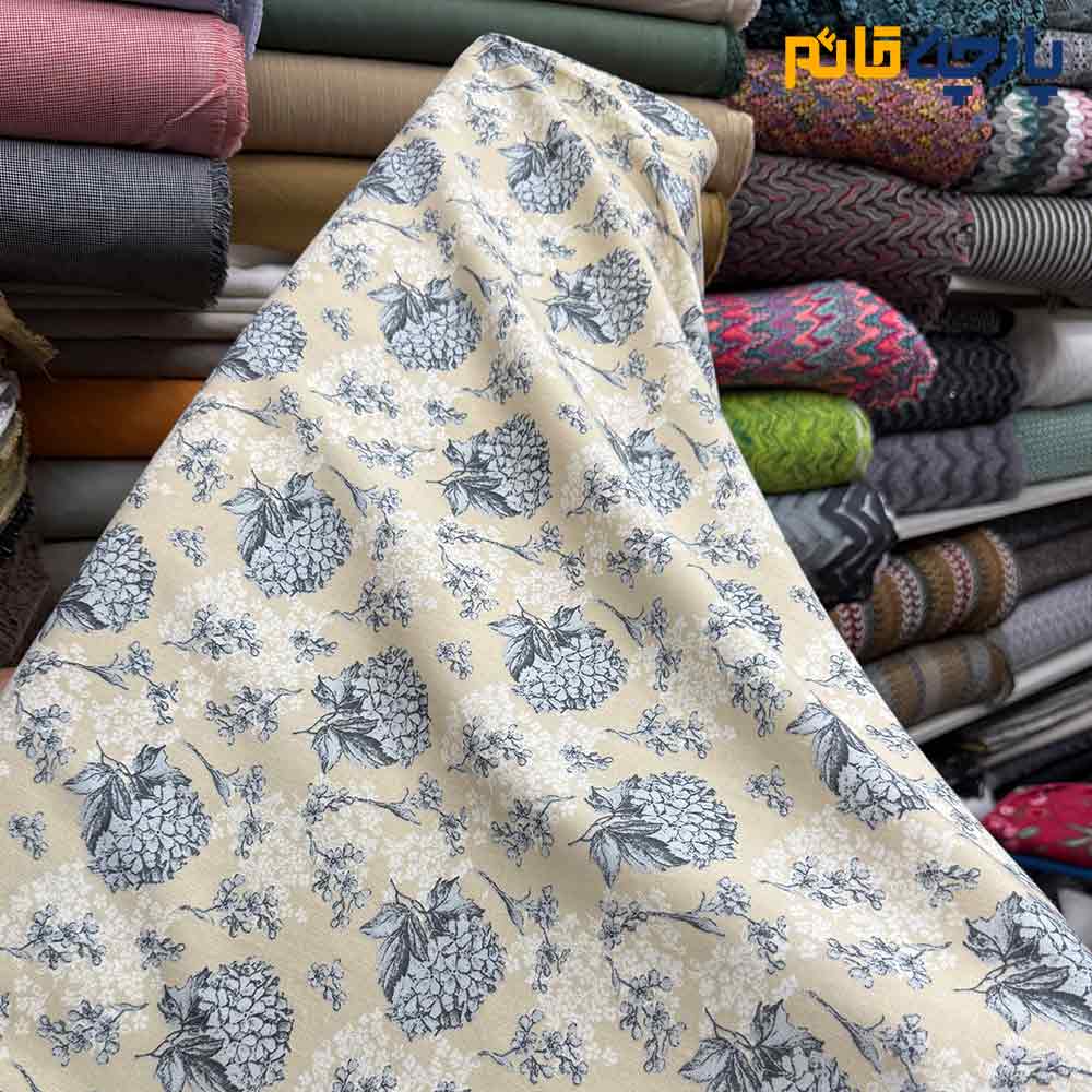 پارچه بهاره تابستانه لینن طرحدار کره ای زمینه کرم لیمونی طرح طوسی