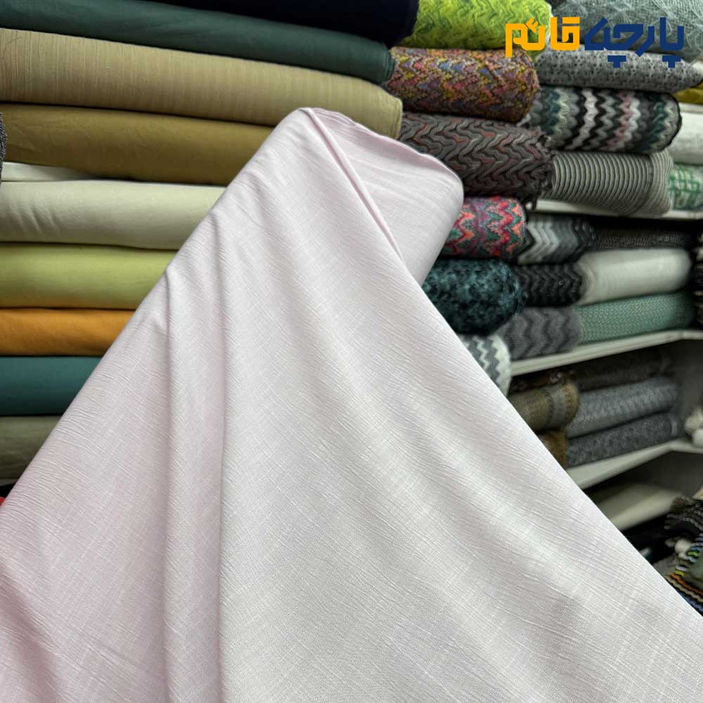 پارچه لینن ساده کرشه رنگ صورتی روشن