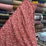 پارچه وال طرحدار زمینه قرمز طرح ریز کرم