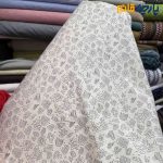 پارچه بهاره و تابستانه لینن طرحدار زمینه کرم طرح مشکی خاص عرض ۱۵۰
