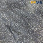 پارچه لینن سانتون طرحدارزمینه سرمه ای طرح کرم