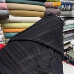 پارچه مجلسی تورکتان کره ای رنگ مشکی طرح خطی برجسته