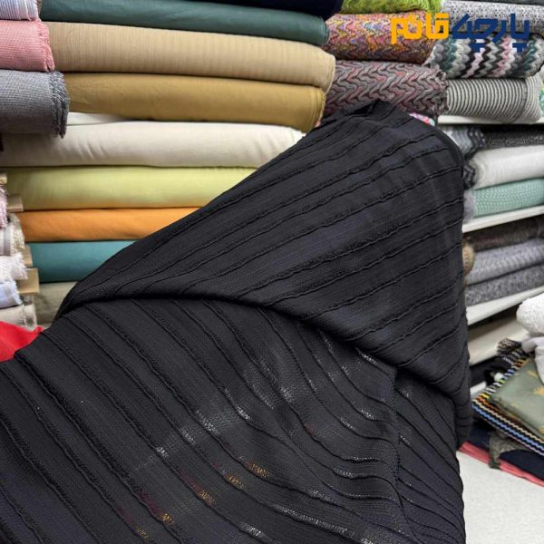 پارچه مجلسی تورکتان کره ای رنگ مشکی طرح خطی برجسته