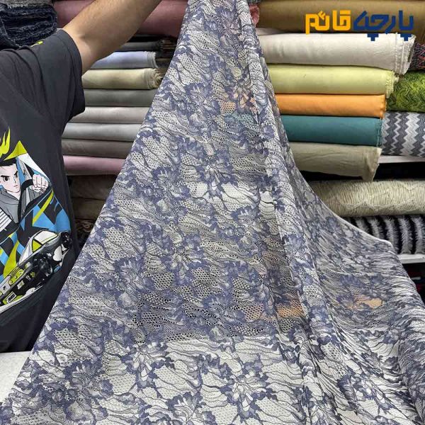 پارچه مجلسی دانتل زمینه روشن طرح متوسط آبی جین