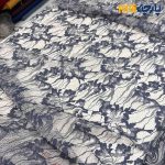 پارچه مجلسی دانتل زمینه روشن طرح متوسط آبی جین