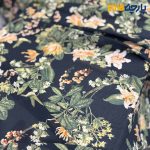 پارچه کرپ نخ طرحدار زمینه مشکی کرشه طرح رنگی