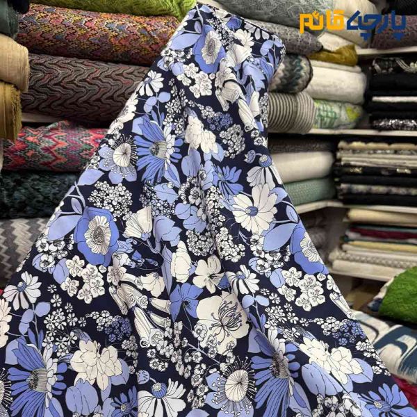 پارچه لینن طرحدار ریکو نخ ایتالیایی گلدار زمینه سرمه ای گل آبی سفید