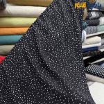 پارچه تابستانه کرپ نخ کره ای خالدار ریز زمینه مشکی