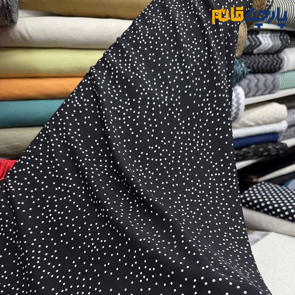 پارچه تابستانه کرپ نخ کره ای خالدار ریز زمینه مشکی