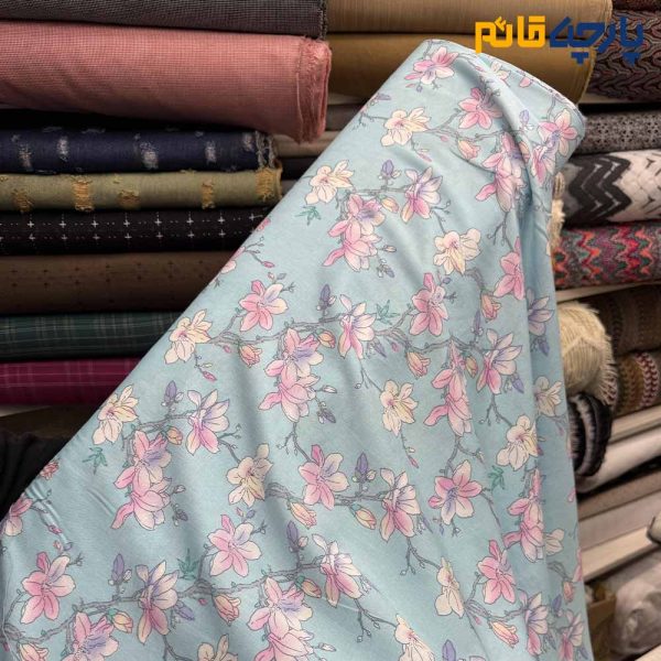 پارچه وال طرحدار کره ای زمینه آبی روشن گل صورتی